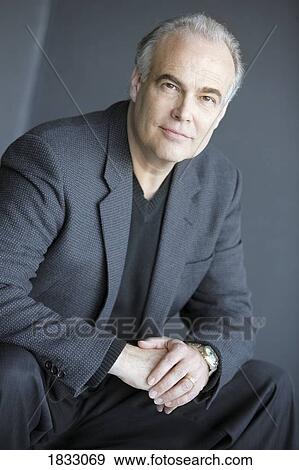 Stock Photo - Portrait of a middle aged man. Fotosearch