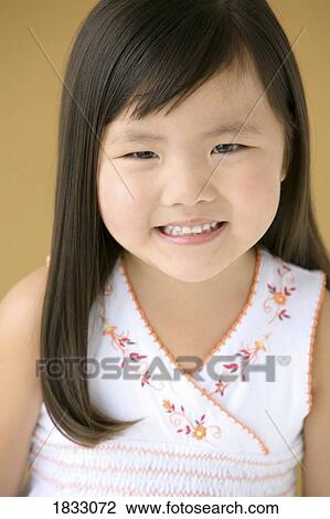 Portrait of a young girl View Large Photo Image Stock Image - Portrait of a young girl. Fotosearch
