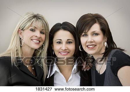 Stock Photo - Portrait of three women. Fotosearch
