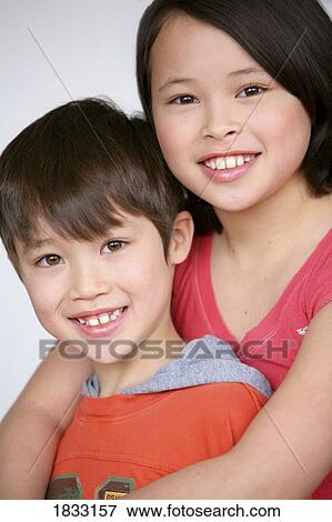 Portrait of young brother and sister View Large Photo Image Stock Photo - Portrait of young brother and sister. Fotosearch