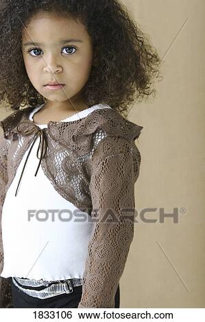 Portrait of young girl View Large Photo Image Stock Photograph - Portrait of young girl. Fotosearch