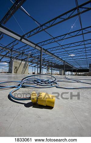 Power cord at a construction site View Large Photo Image Stock Image - Power cord at a construction site. Fotosearch