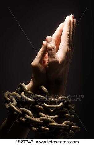 Praying with chains View Large Photo Image Stock Image - Praying with chains. Fotosearch