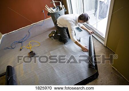 Preparing to install laminate flooring View Large Photo Image Stock Image - Preparing to install laminate flooring. Fotosearch