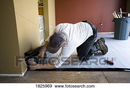 Preparing To Install Laminate Flooring Stock Photo 1825969