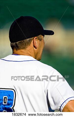 Picture - Rear view of a baseball player. Fotosearch