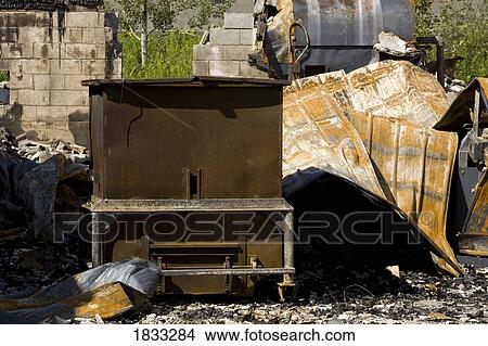 Picture - Remnants of burnt down building. Fotosearch