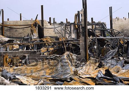 Stock Image - Remnants of burnt down building. Fotosearch