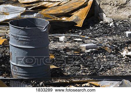 Remnants of burnt down building View Large Photo Image Stock Photo - Remnants of burnt down building. Fotosearch