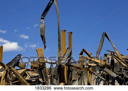 Remnants of burnt down building View Large Photo Image Stock Photograph - Remnants of burnt down building. Fotosearch