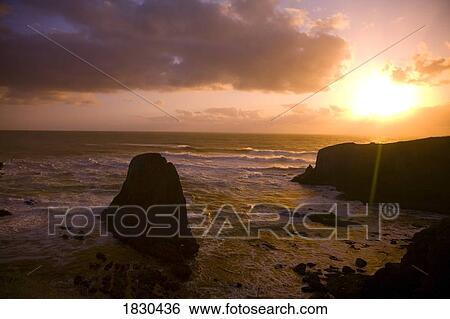 Rocky coastline at sunset View Large Photo Image Stock Photograph - Rocky coastline at sunset. Fotosearch