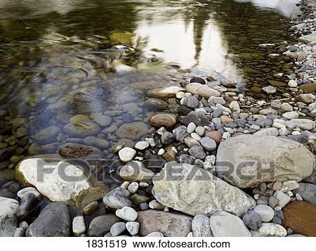 Stock Photo - Rocky shore, Whistler, BC, Canada. Fotosearch
