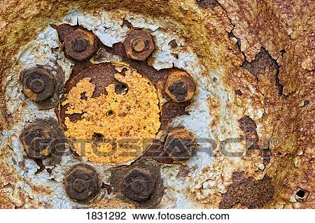 Stock Image - Rusted wheel with bolts. Fotosearch