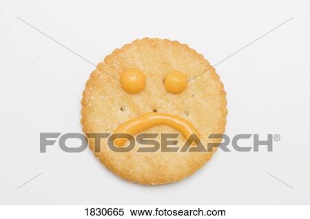 Stock Photography - Sad face cracker. Fotosearch