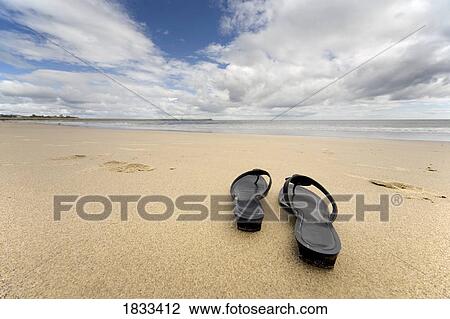 Sandals on the beach View Large Photo Image Stock Image - Sandals on the beach. Fotosearch