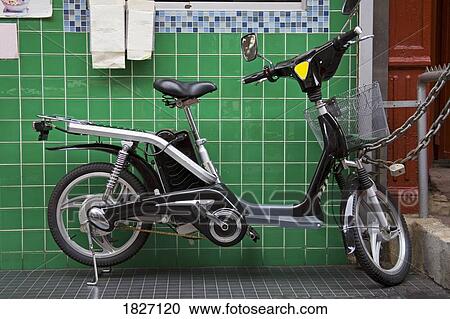 Stock Image - Scooter in Chinatown, Lower Manhattan, New York City, New York, USA . Fotosearch