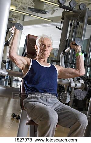 Senior man working out View Large Photo Image Stock Photo - Senior man working out. Fotosearch