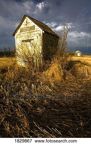 Stock Photo - Shack in field. Fotosearch
