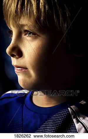 Stock Image - Side view of boy's face. Fotosearch