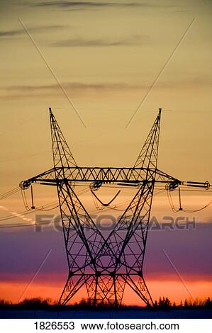 Silhouetted transmission tower View Large Photo Image Stock Image - Silhouetted transmission tower. Fotosearch