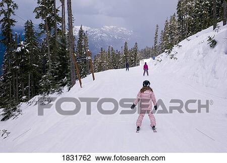 Stock Image - Skiers skiing. Fotosearch