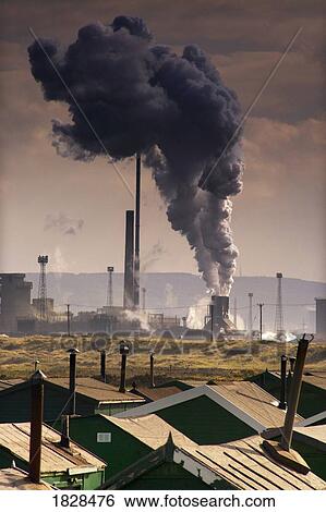Smoke stacks behind dumpsters, Teesside, England View Large Photo Image Stock Photograph - Smoke stacks behind dumpsters, Teesside, England. Fotosearch