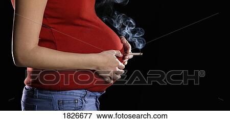 Stock Photo - Smoking a cigarette for baby. Fotosearch