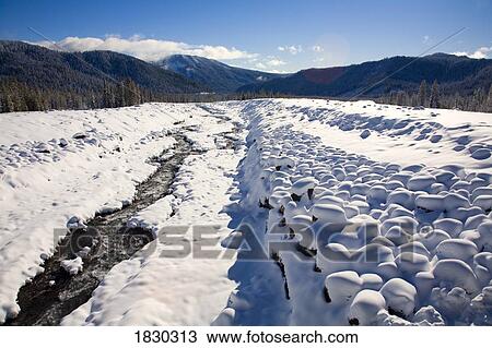 Snow-covered river, Cascades Mountains, Oregon, USA View Large Photo Image Stock Image - Snow-covered river, Cascades Mountains, Oregon, USA. Fotosearch