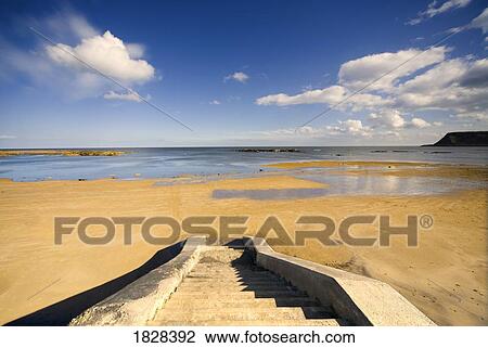 Stock Image - Steps leading down to beach, Scarborough, Yorkshire, England. Fotosearch