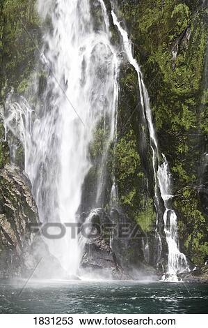 Stock Image - Stirling Falls in Milford Sound, New Zealand. Fotosearch