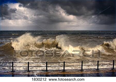 Stock Image - Stormy seascape, Sunderland, Tyne and Wear, England. Fotosearch