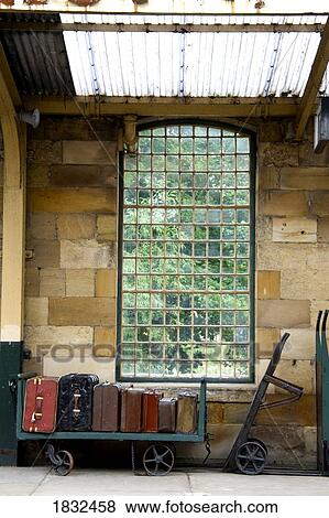 Suitcases On A Luggage Trolley In A Train Station View Large Photo Image Stock Photo - Suitcases On A Luggage Trolley In A Train Station. Fotosearch