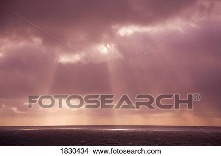 Sunbeams over the Pacific Ocean, from the Yaquina Head Lighthouse, Oregon, USA View Large Photo Image Picture - Sunbeams over the Pacific Ocean, from the Yaquina Head Lighthouse, Oregon, USA. Fotosearch