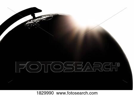 Stock Image - Sunlight over globe. Fotosearch