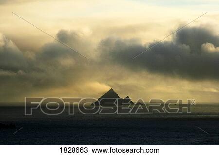 Sunset over one of Blasket Islands, County Kerry, Ireland View Large Photo Image Stock Image - Sunset over one of Blasket Islands, County Kerry, Ireland. Fotosearch