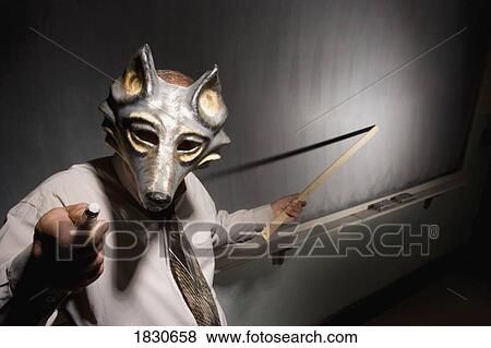 Teacher wearing an animal mask View Large Photo Image Stock Photo - Teacher wearing an animal mask. Fotosearch