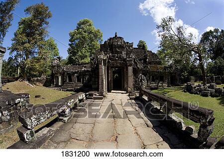 Stock Image - Temple ruins in the ancient city of Angkor Wat, Northwestern Cambodia. Fotosearch