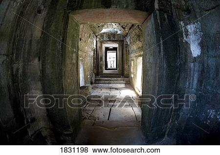 Temple ruins in the ancient city of Angkor Wat, Northwestern Cambodia View Large Photo Image Stock Photo - Temple ruins in the ancient city of Angkor Wat, Northwestern Cambodia. Fotosearch
