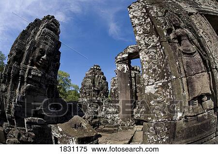 The faces of the Bayon temple in the ancient city of Angkor, in northwestern Cambodia View Large Photo Image Stock Photography - The faces of the Bayon temple in the ancient city of Angkor, in northwestern Cambodia. Fotosearch