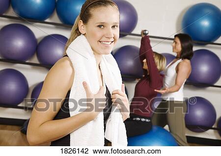Three women in the gym View Large Photo Image Stock Image - Three women in the gym. Fotosearch
