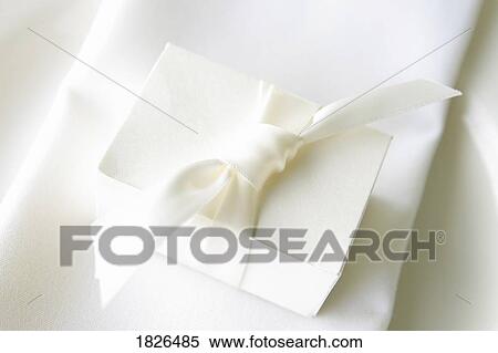 Stock Photography - Tiny package. Fotosearch