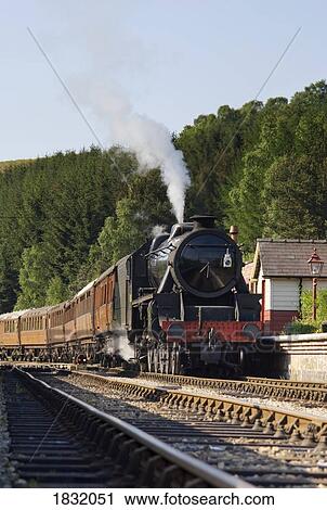 Stock Image - Train at station in Goathland, North Yorkshire, England. Fotosearch