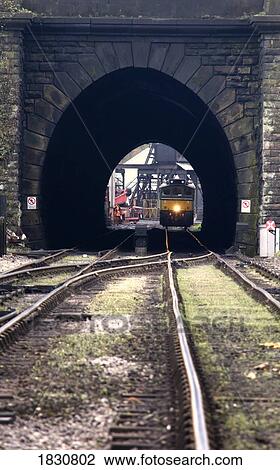 Stock Image - Train in tunnel. Fotosearch