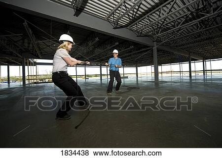 Tug of war View Large Photo Image Stock Photo - Tug of war. Fotosearch