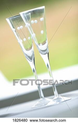 Two champagne glasses View Large Photo Image Stock Image - Two champagne glasses. Fotosearch