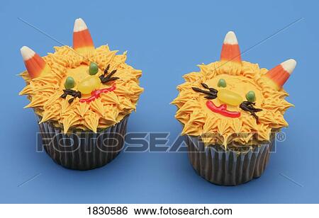 Two lion cupcakes View Large Photo Image Stock Photograph - Two lion cupcakes. Fotosearch