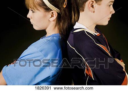 Stock Image - Two teenagers angry with each other. Fotosearch