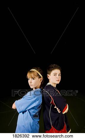 Stock Image - Two teens angry with each other. Fotosearch