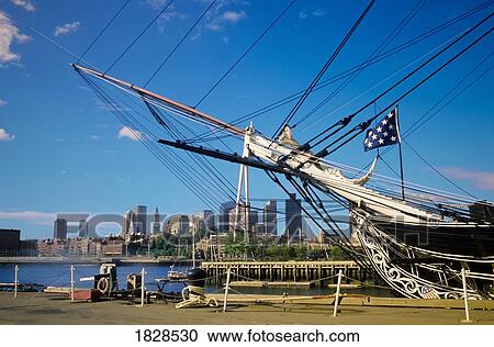 Stock Image - USS Constitution historic ship and skyline, Boston, Massachusetts, USA. Fotosearch