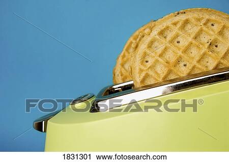 Waffles in a toaster View Large Photo Image Stock Image - Waffles in a toaster. Fotosearch